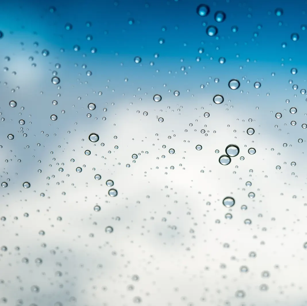 Water drops on a glass surface, simulating high humidity - Frost Flare