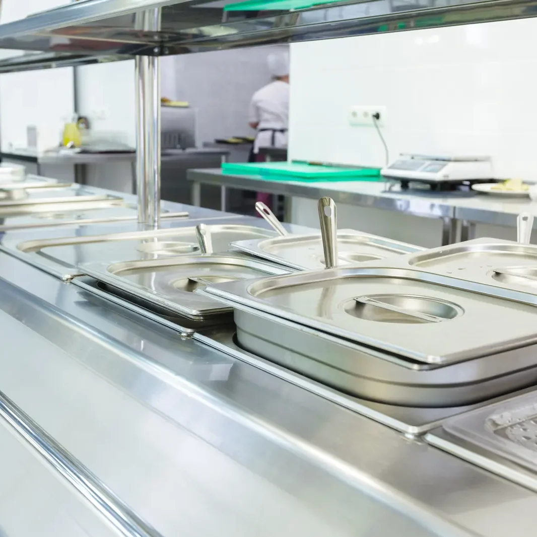 Stainless steel preparation area in a restaurant kitchen - Frost Flare