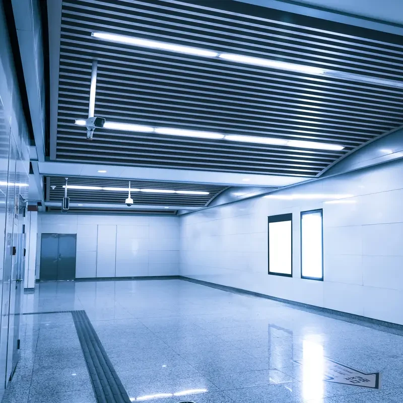 The cooling room at Frost Flare, featuring large industrial tanks and sophisticated cooling systems enveloped in a cold, misty atmosphere.